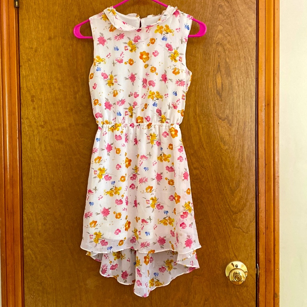 Flower summer dress , ages 11-12 , white with pink yellow and orange flowers.